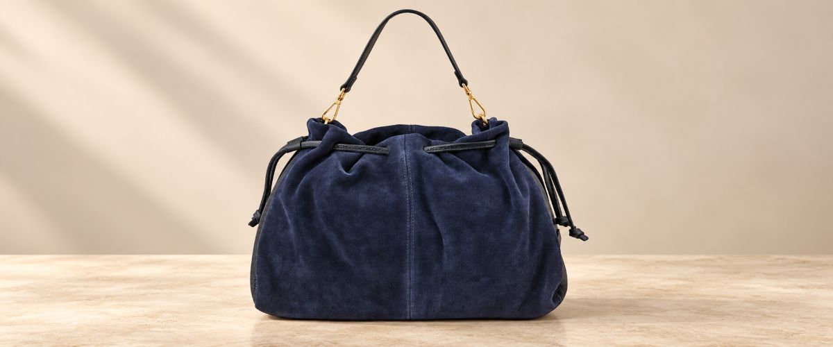 Suede leather shopping bag illustrating a soft textured finish